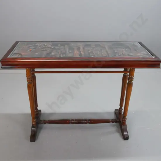 asian hardwood side table w/ carved scholar scene in top under inset glass top, on turned stretcher base with turned