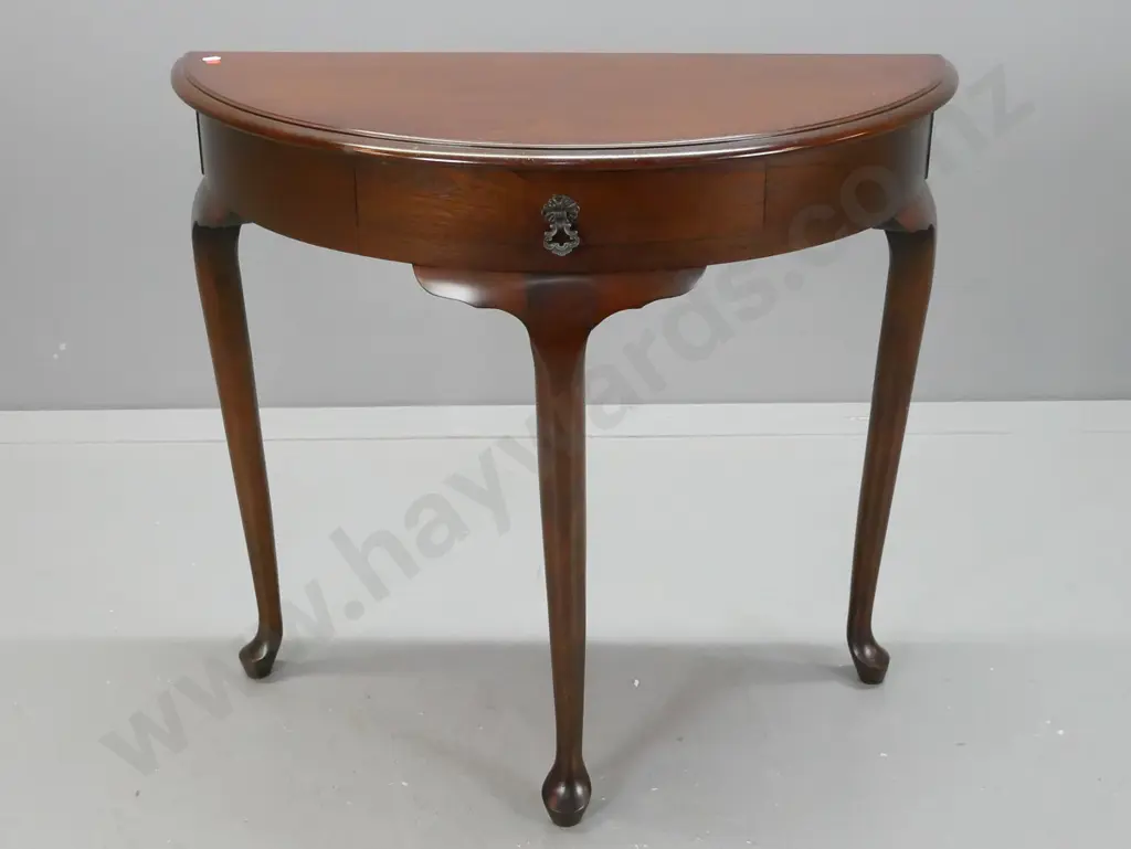 reproduction mahogany half round 3 legged hall table with cab legs, drawer w/ drop handle - minor scratching to top Image 1++