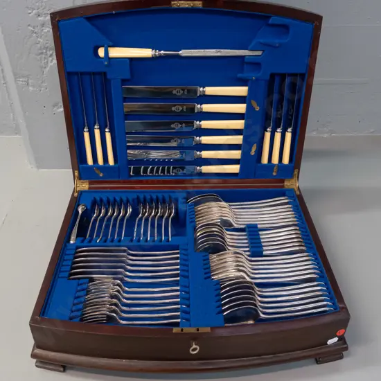 Mahogany cased EPNS cutlery set - bone-handled knives marked Sheffield Firth Stainless, working lock & key, missing the