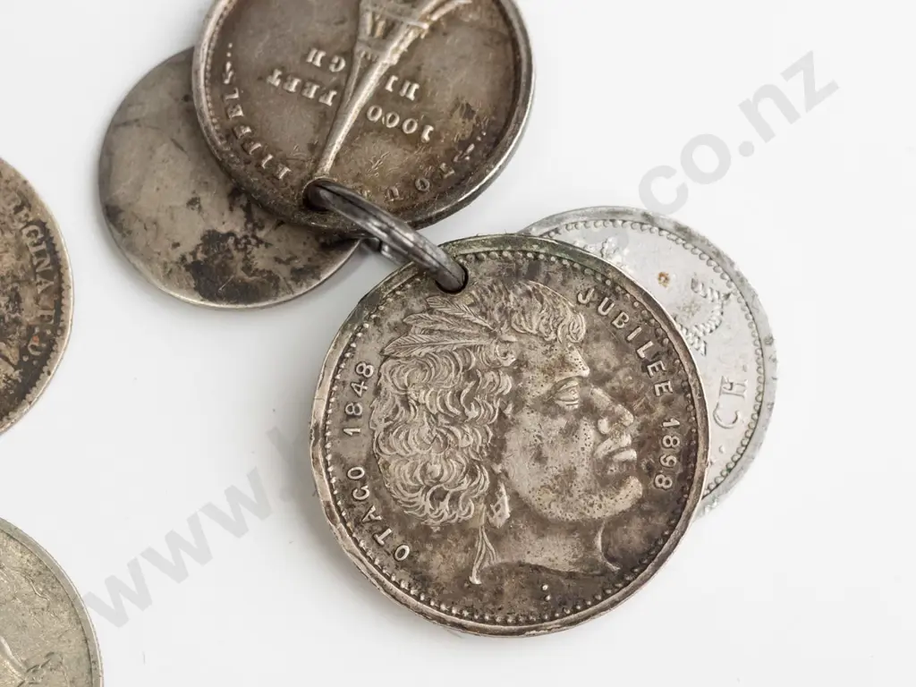 assorted vintage coins including American dimes and buffalo nickels, NZ and English three pence, pierced 1898 Otago Image 1++