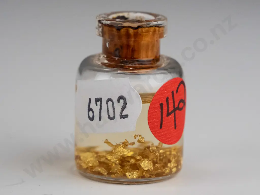 bottle with 22ct gold leaf Image 1++