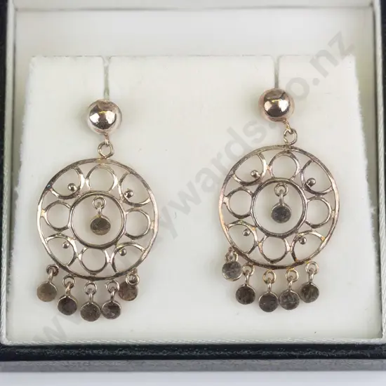 pair of silver earrings no mark