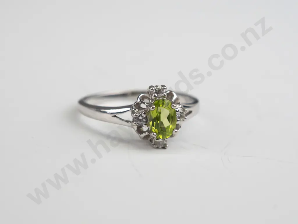 silver light green stone & cz ring stamped 925 Size T.5 Image 1++