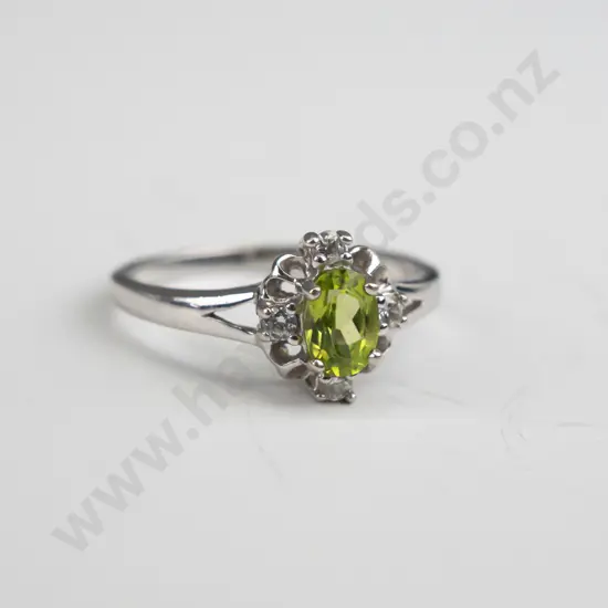 silver light green stone & cz ring stamped 925 Size T.5