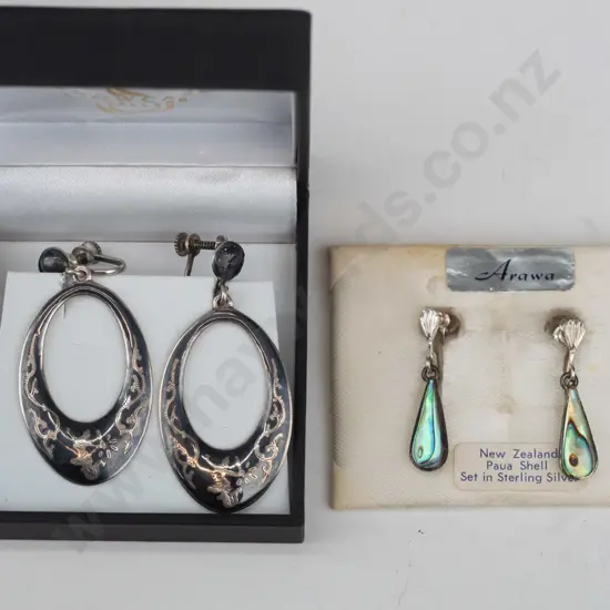 2 pairs of screw on earring both stamped sterling silver