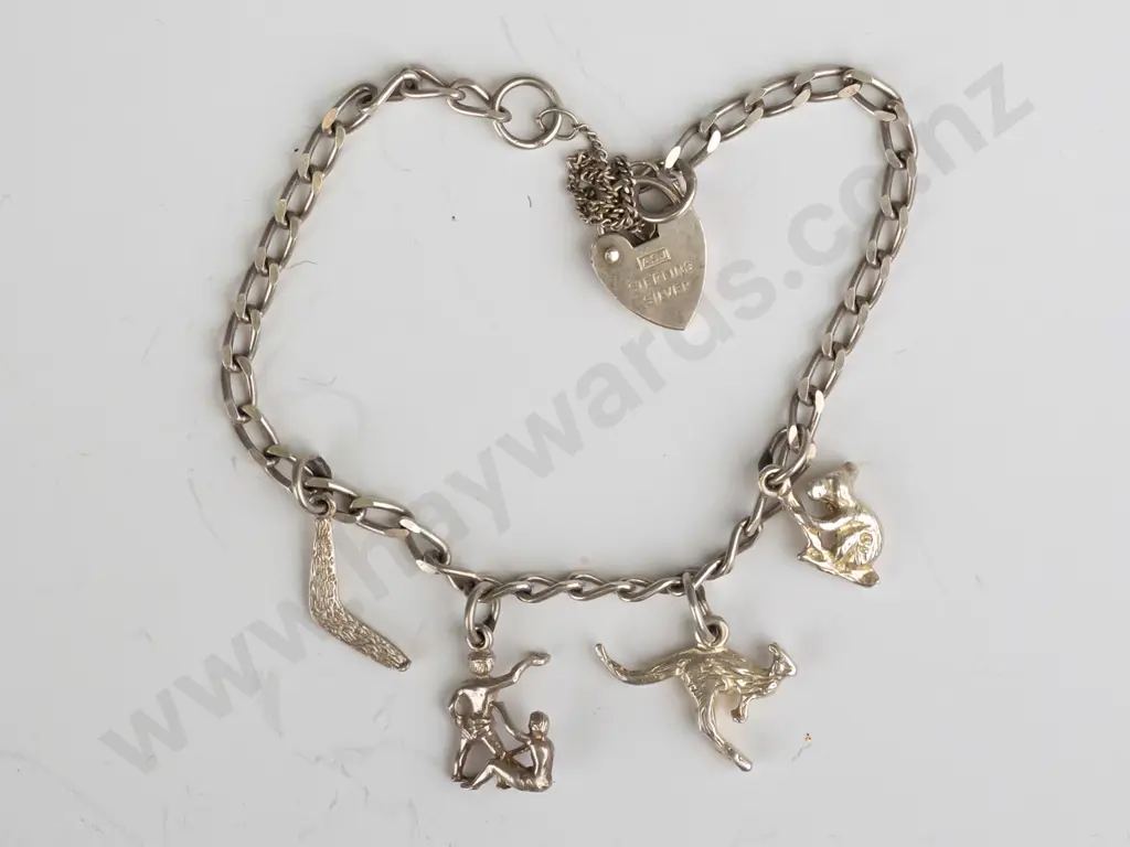 sterling silver bracelet with 4x Australian themed charms Image 1++