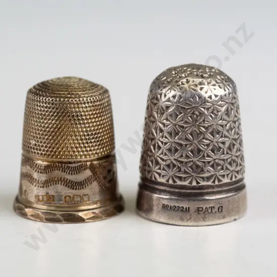 2 silver thimbles - finer one EHM - all over pattern marked