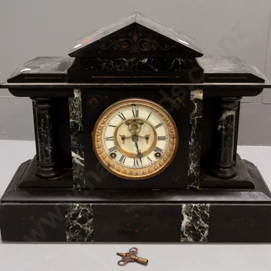 heavy black Belgian marble mantel clock with contrasting marble or agate pillars and edging, chiming Ansonia USA open-