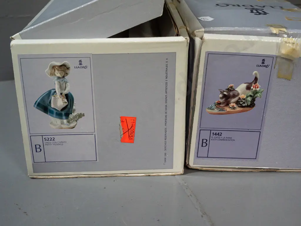 2 Lladro figurines with original boxes - girl with flower basket H-180 and cat & frog - wear and tape residue on boxes Image 1++