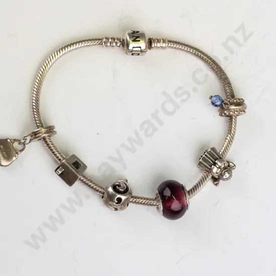 sterling silver Pandora bracelet with 6x charms