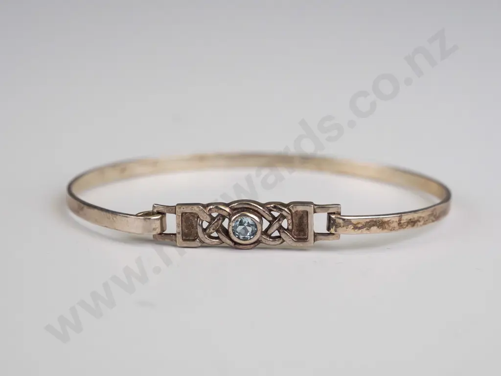 silver bangle with light blue stone stamped 925 Image 1++