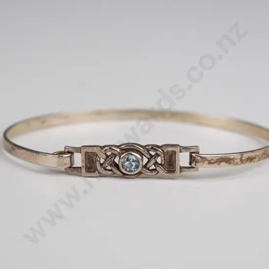 silver bangle with light blue stone stamped 925