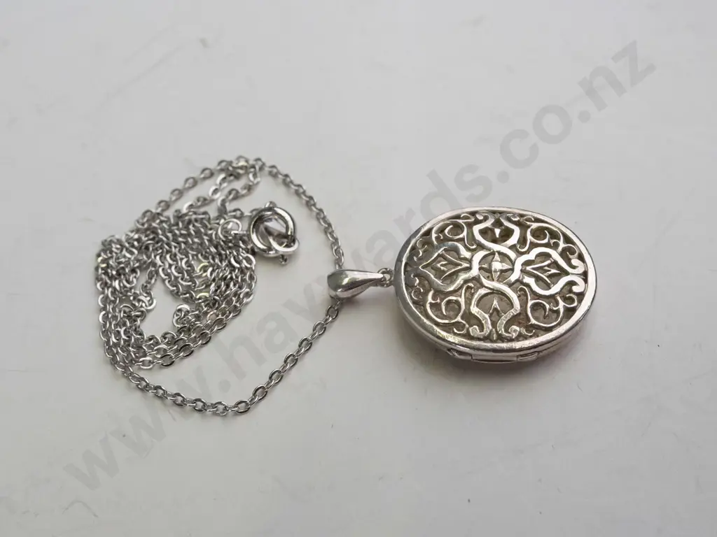 silver locket stamped stg no mark on chain Image 1++