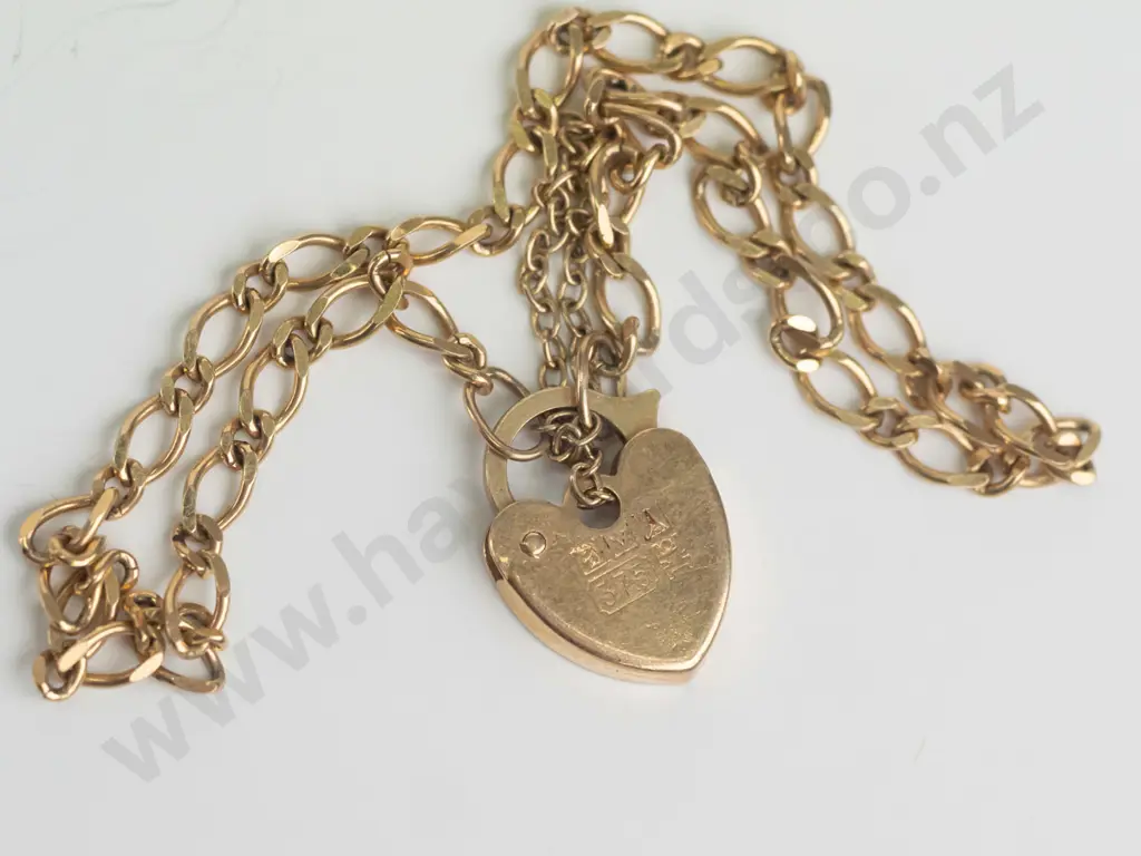 9ct figaro bracelet with heart catch 2.6gms Image 1++