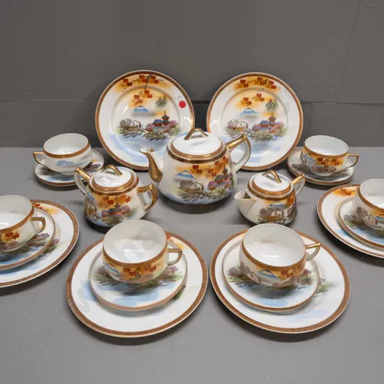 Japanese tea set with lithophane geisha image in tea cup base - marked H.F.T.C. hand-painted 24k gold. 6 trios, teapot,