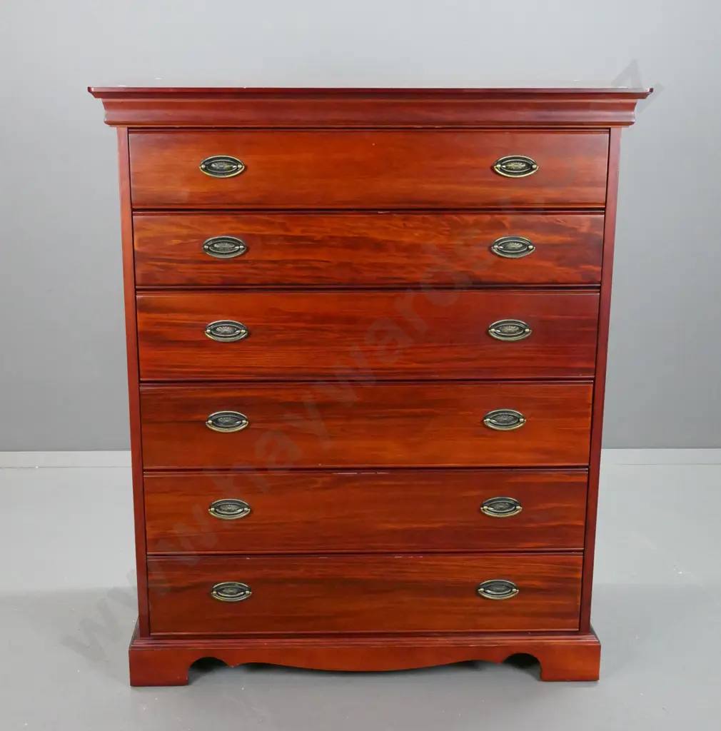 Reproduction 6 long drawer, pacific kauri chest,  with stepped top on shaped plinth, oval brass handles. Image 1++