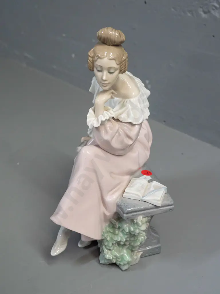 Lladro figurine - seated woman with fan and book H-300 W-180 at base Image 1++