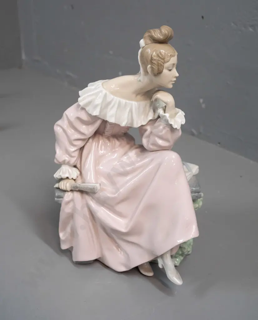 Lladro figurine - seated woman with fan and book H-300 W-180 at base Image 1++