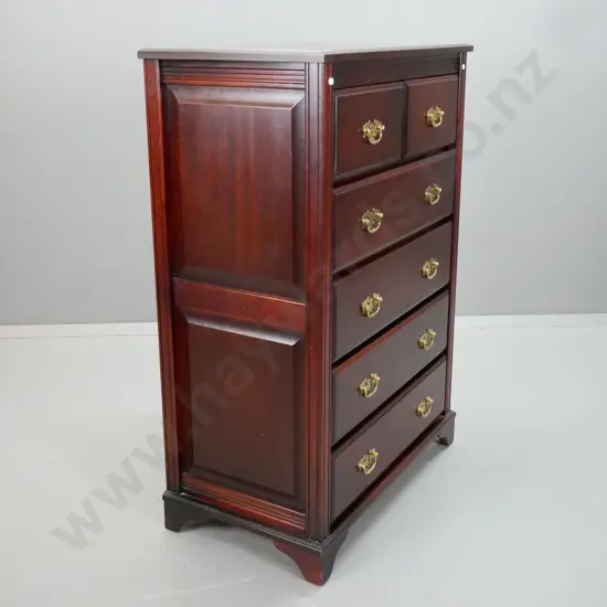 reproduction mahogany 6-drawer chest with shaped brass handles, panelled sides, on bracket feet. Some wear on top and on
