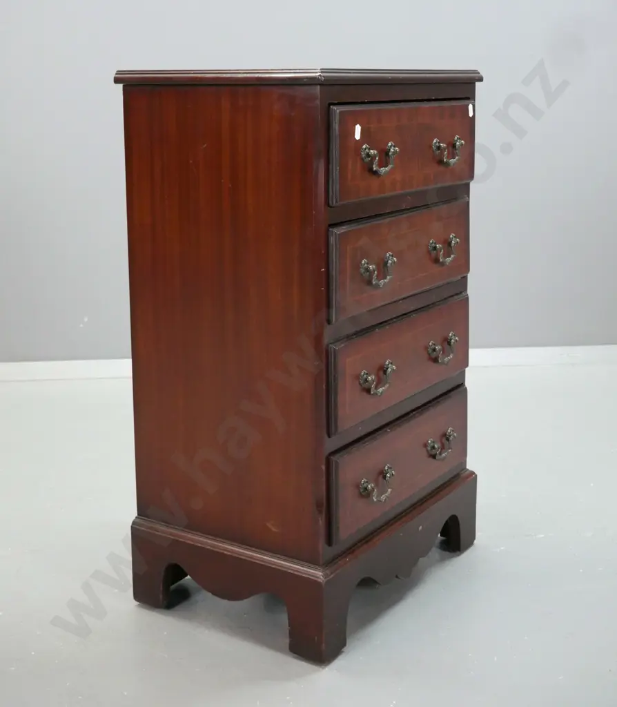 reproduction mahogany Sheraton style bedside / small chest of 4 drawers with inlaid stringing, cross-banded top and Image 1++