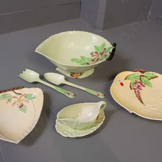 4 pieces of Carlton ware - leaf shaped salad bowl with servers, 2 trays, small sauce jug on tray. Spot of discolouration