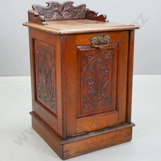Victorian walnut pull out coal scuttle, with shaped foliate gallery & carved foliate panels to sides & front,