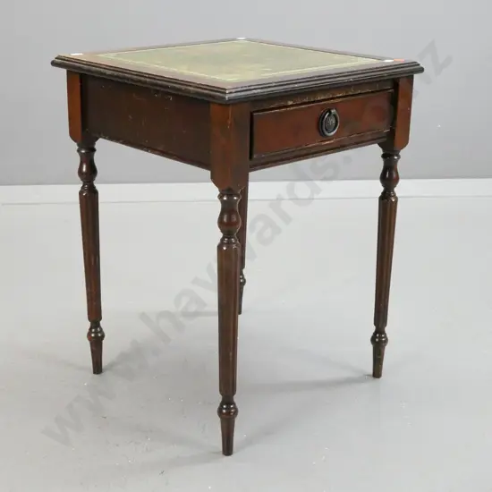 walnut small side table with tooled leather inset top, on turned fluted legs, single drawer with drop handle - some