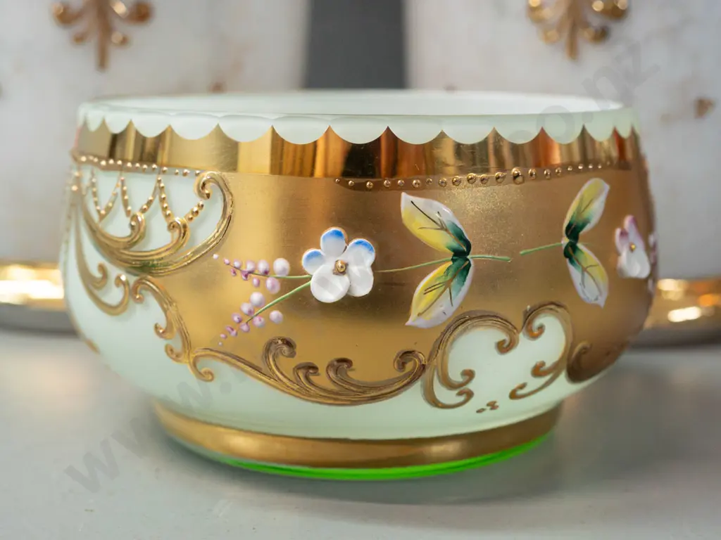 4 pieces of Bohemian glass, 3 in matching gilt and enamel over white, smaller bowl in light green over white - tall pair Image 1++