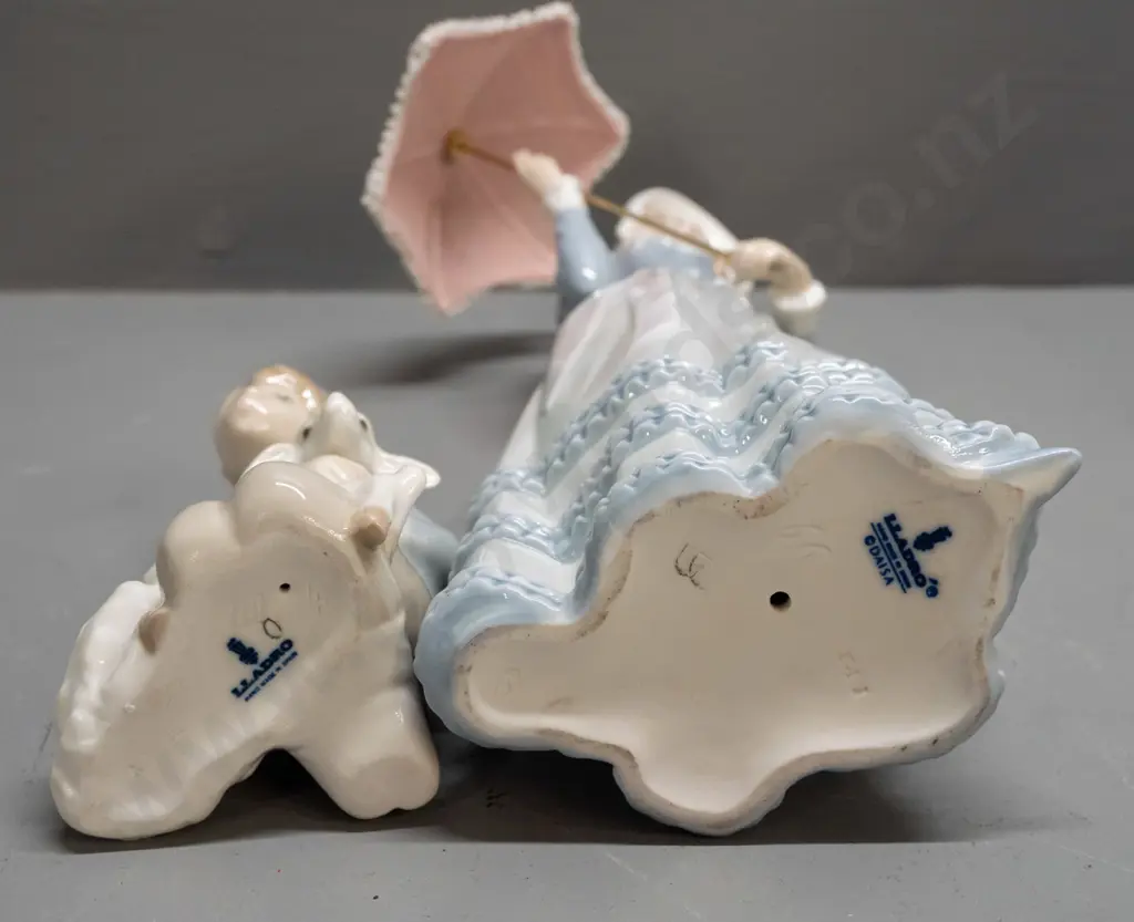 2 Lladro figures - woman with parasol H-320 and a boy with lamb Image 1++