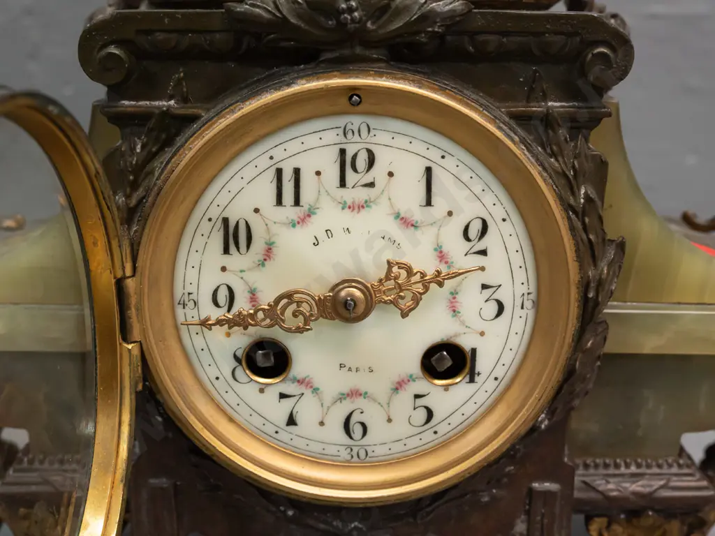 vintage mantel clock with winged angel (figure marked "France") on green onyx and ormolu decorated base with ram's Image 1++