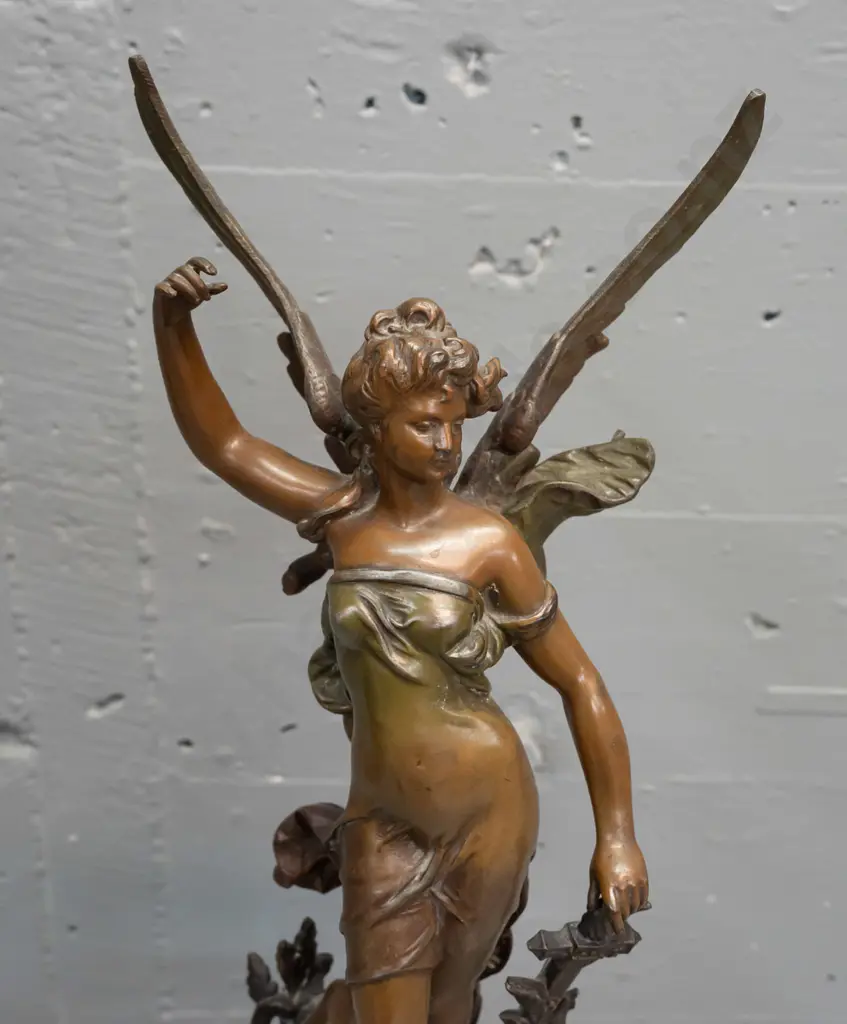 vintage mantel clock with winged angel (figure marked "France") on green onyx and ormolu decorated base with ram's Image 1++