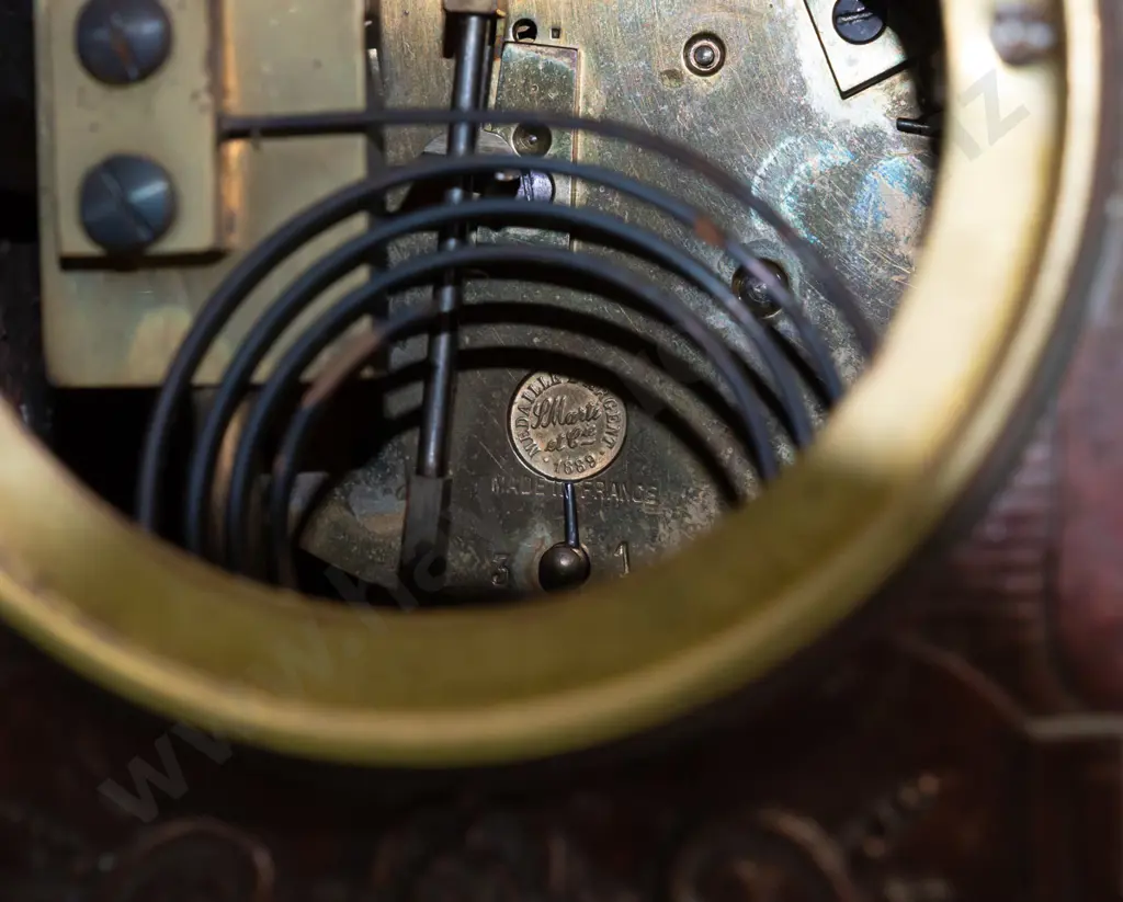 vintage mantel clock with winged angel (figure marked "France") on green onyx and ormolu decorated base with ram's Image 1++