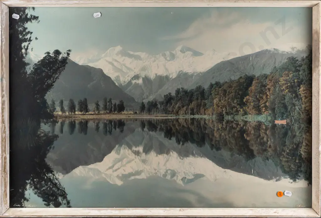 Whites Aviation -- framed hand-coloured photograph "Lake Matheson" H-485 W-735 [some foxing and dirt under glass, stains Image 1++