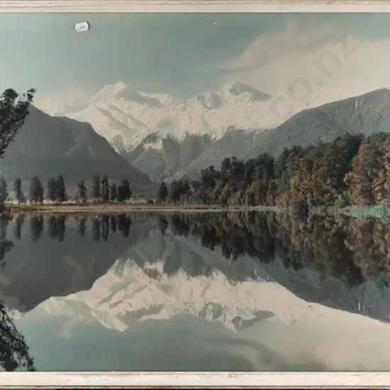 Whites Aviation -- framed hand-coloured photograph "Lake Matheson" H-485 W-735 [some foxing and dirt under glass, stains