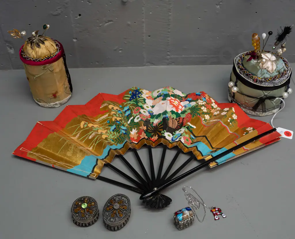 2 cylindrical fabric-covered pin cushions with assorted hat and lapel pins, Japanese timber and paper fan, millefiore Image 1++