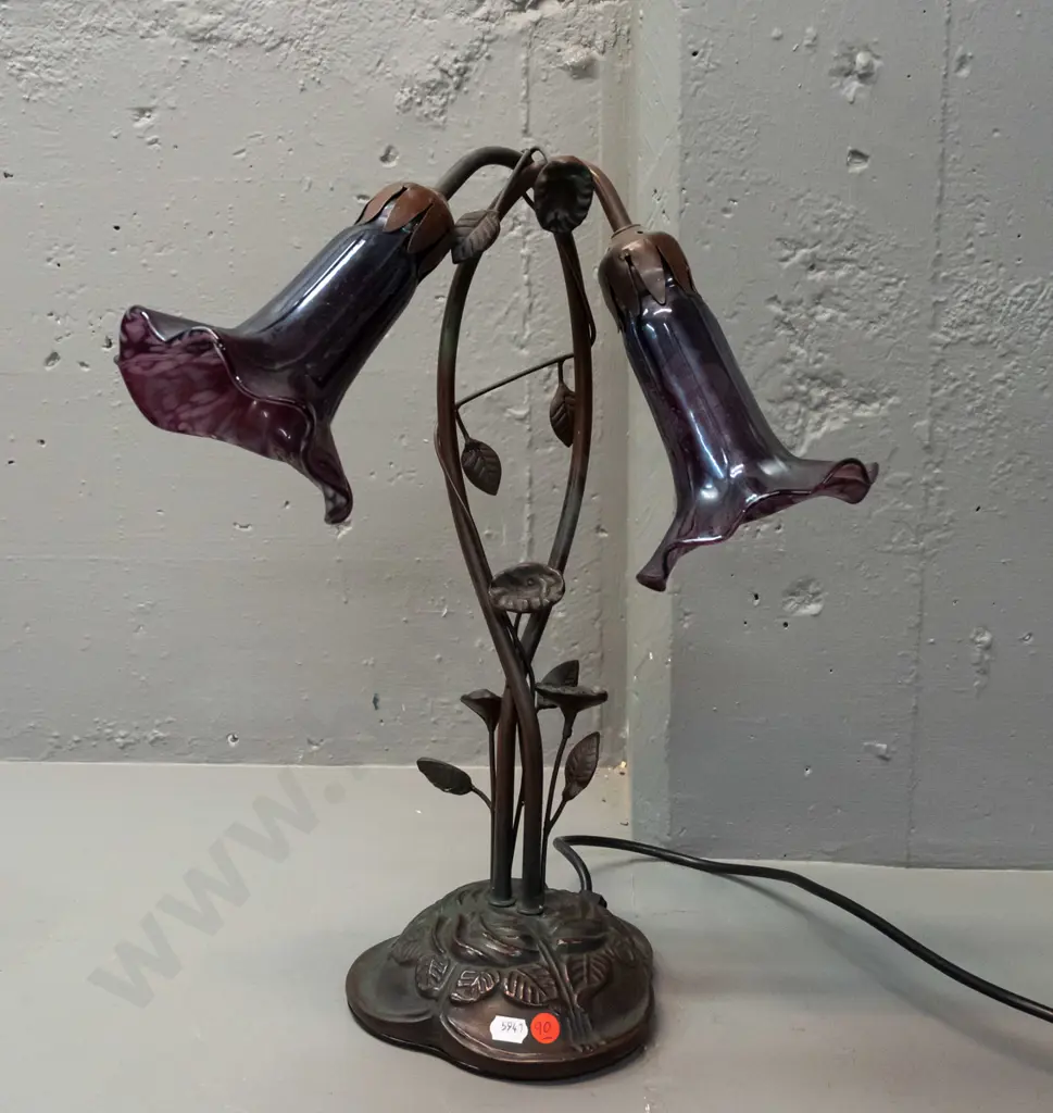 Tiffany style 2-light lily motif table lamp w/ cast metal base, twined foliage stem, purple mottled lustre glass shades Image 1++