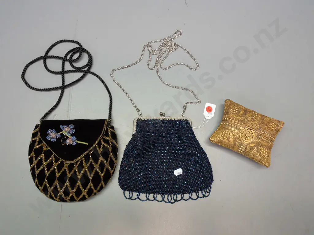 black velvet purse with glass bead and wire decoration, lustre glass bead purse with chromed chain and a clamshell purse Image 1++