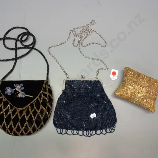 black velvet purse with glass bead and wire decoration, lustre glass bead purse with chromed chain and a clamshell purse