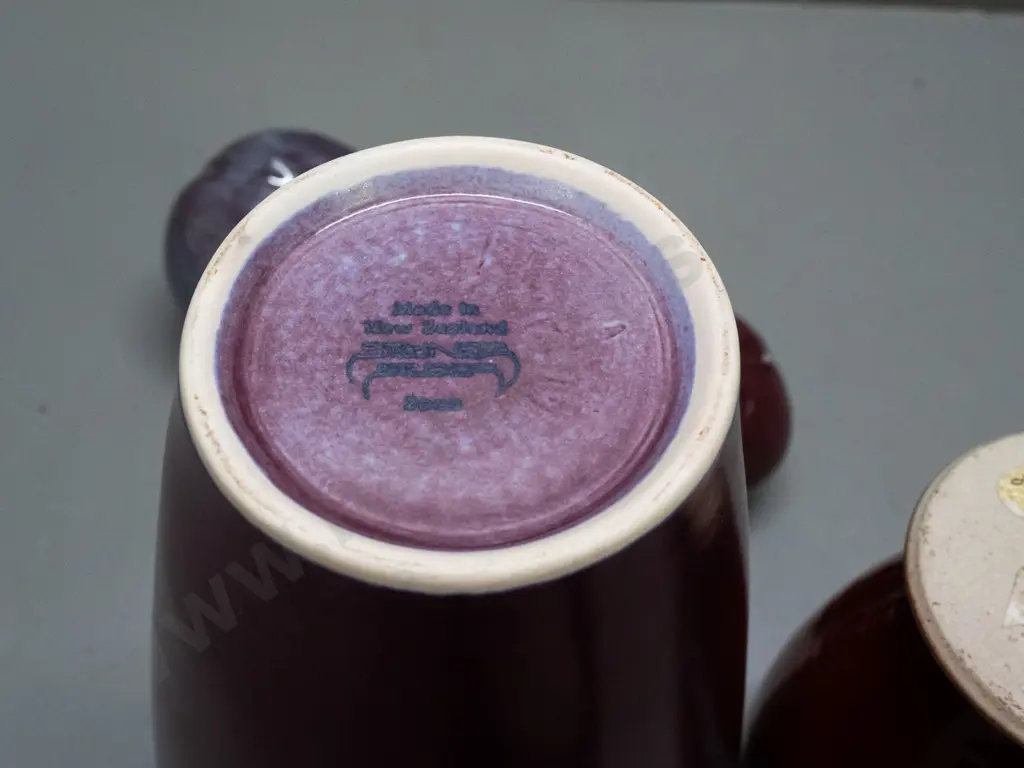 assorted studio pottery items - Hans Bauer Anathoth Pottery vase, tall Steiner NZ vase, 3 fruit ornaments, 2 w/ unknown Image 1++