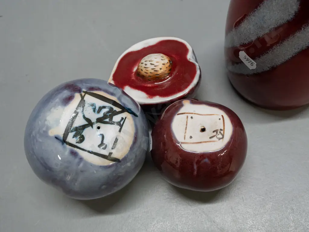 assorted studio pottery items - Hans Bauer Anathoth Pottery vase, tall Steiner NZ vase, 3 fruit ornaments, 2 w/ unknown Image 1++