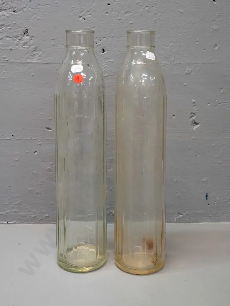 2 Shell New Zealand Ltd. clear glass quart oil bottles - one has oil residue H-370 Image 1++