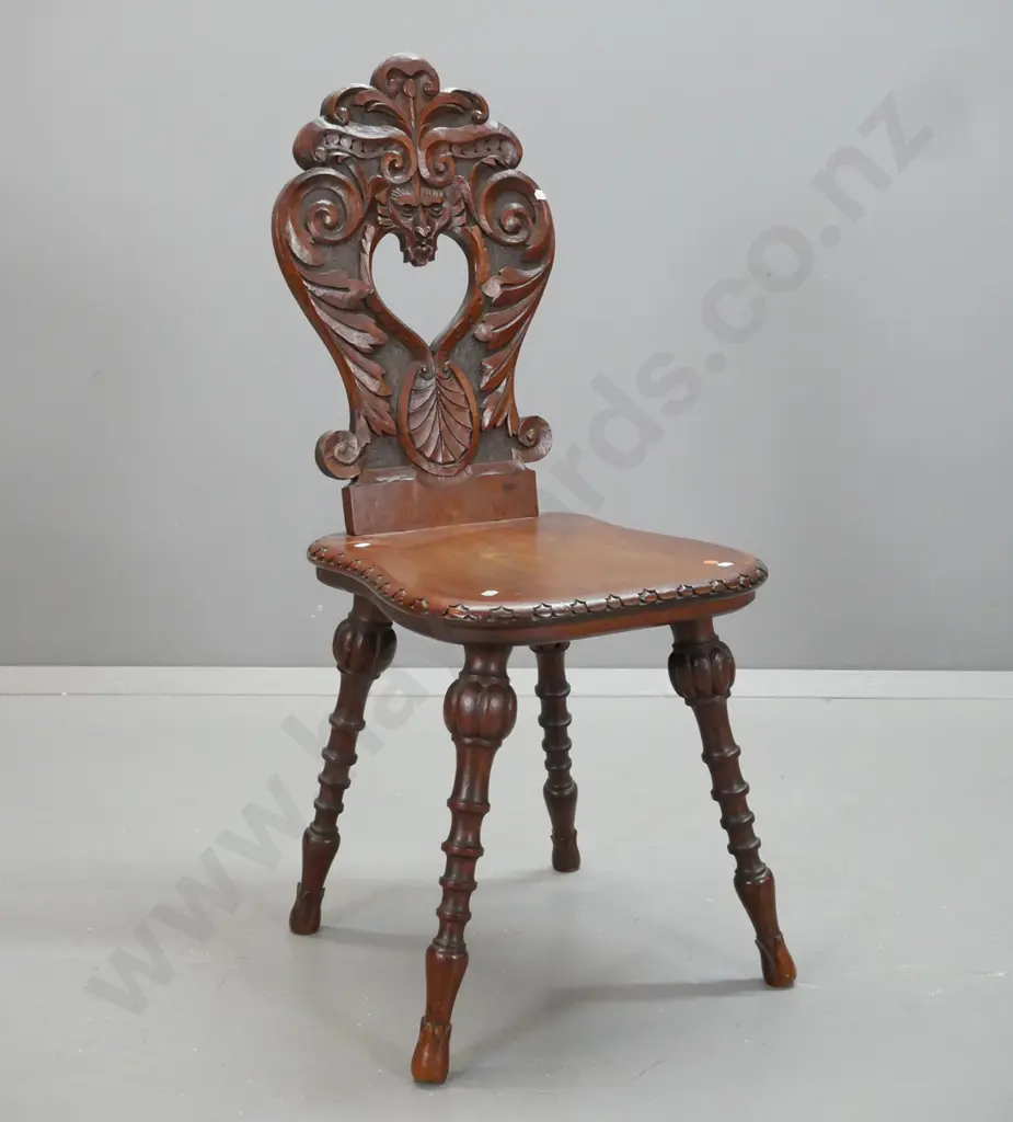 colonial carved kauri and rimu hall chair with shaped back, on turned melon shaped legs, foliate foot - one loose front Image 1++