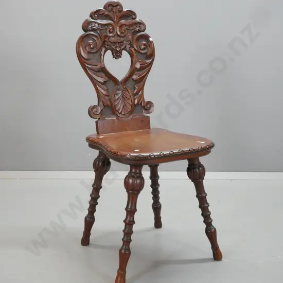 colonial carved kauri and rimu hall chair with shaped back, on turned melon shaped legs, foliate foot - one loose front