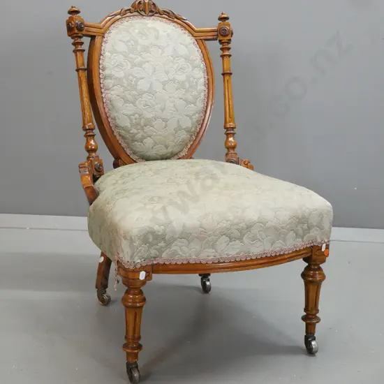 Victorian walnut bedroom chair with medallion shaped back, turned fluted supports, floral upholstered seat and back, on