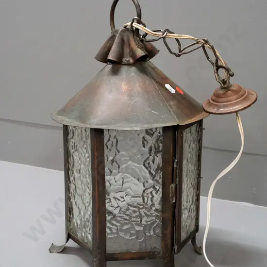 arts & crafts style copper hexagonal hanging lantern light fitting with textured glass panels, one hinged, bayonet bulb