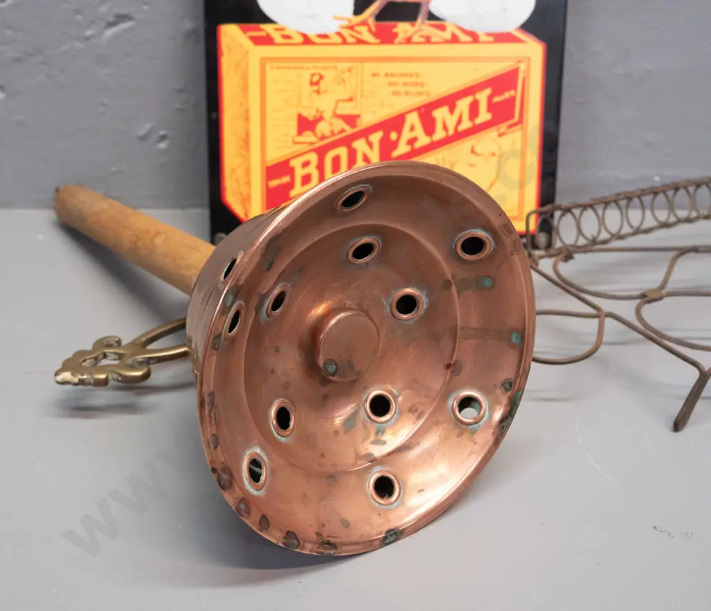 vintage wood-handled copper washing agitator, cast brass trivet, reproduction enamel sign H-240 W-200 and a wire trivet Image 1++