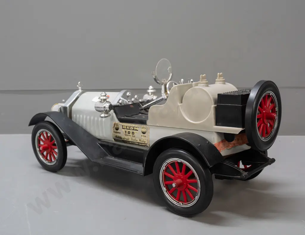 Jim Beam automotive decanter - Stutz Bearcat, with contents, seal worn but intact, crack to wind-screen, has a little Image 1++