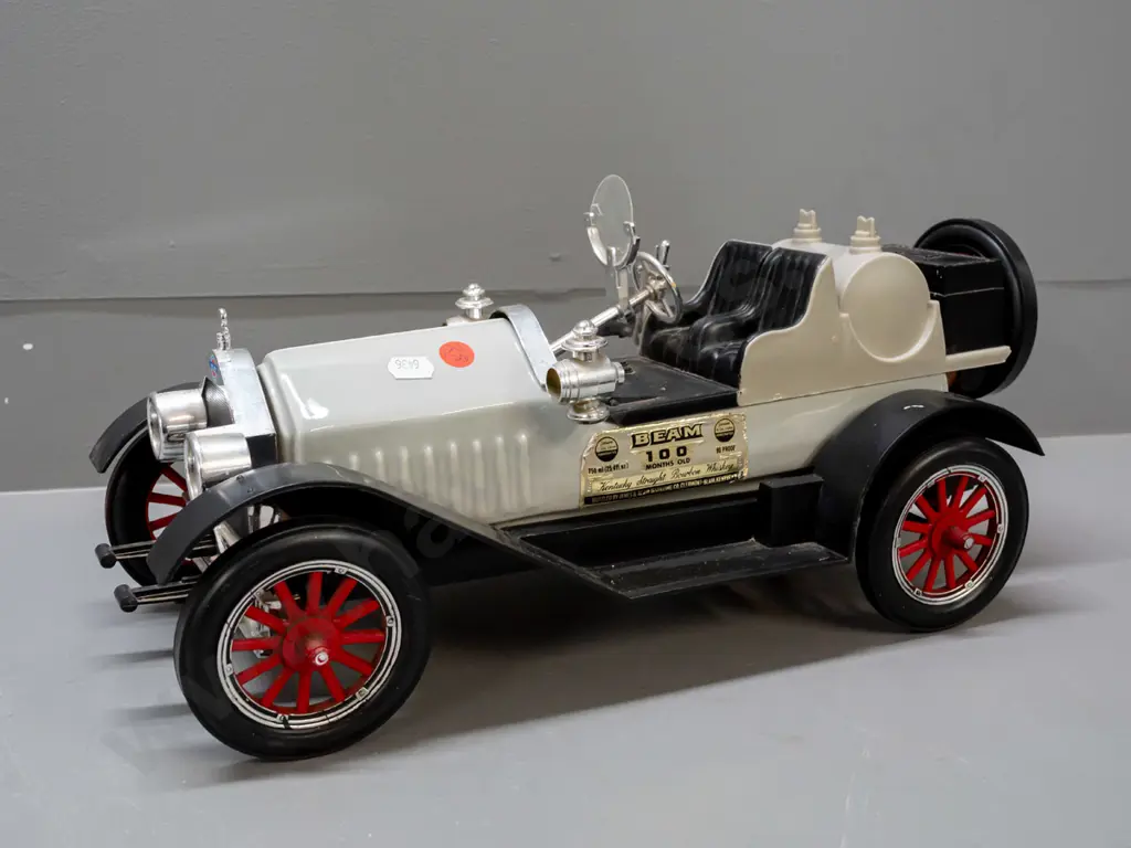 Jim Beam automotive decanter - Stutz Bearcat, with contents, seal worn but intact, crack to wind-screen, has a little Image 1++