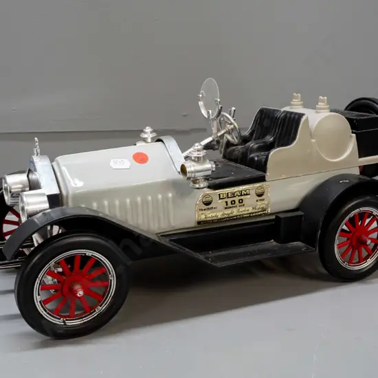 Jim Beam automotive decanter - Stutz Bearcat, with contents, seal worn but intact, crack to wind-screen, has a little