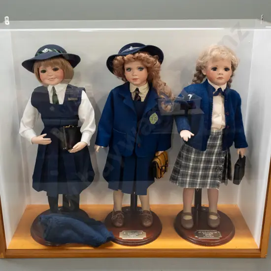3 display dolls in perspex and mdf display case - dolls made by Lois Quinn with uniforms of Philomena's and Moreau